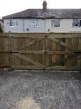construction of garden gates using screws tanallised timber concrete posts.
