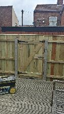 garden gate and fence using tanallised timber.