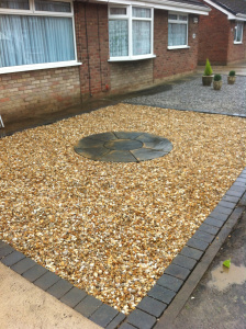 Golden corn gravell. decorative paved circle concreted in to place.