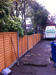 garden fencing,concrete posts,gravell boards.